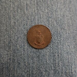 Antique Copper Coin with Shield Design